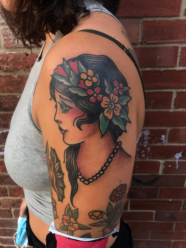 Explore joker tattoo ideas for guys, creative tattoo ideas in Springfield, available at Good Heart Tattoos