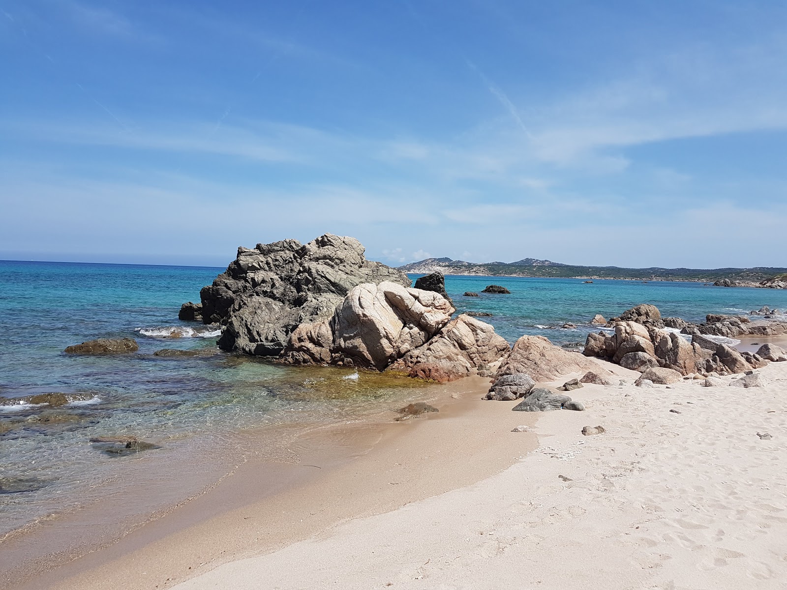 Foto van Spiaggia Rena Di Matteu met turquoise puur water oppervlakte