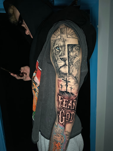 Explore cover up hand tattoo ideas, creative tattoo ideas in Tampa, available at Emphasis Tattoo