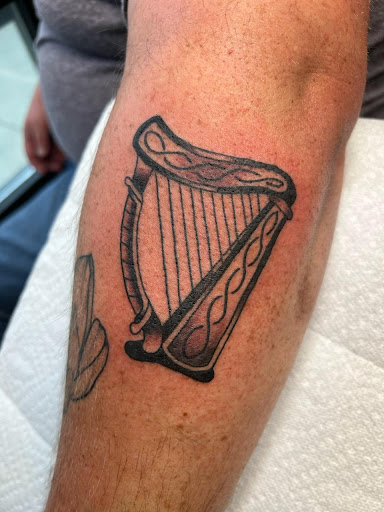 Explore healing symbol tattoo ideas, creative tattoo ideas in Des Moines, available at Iron Heart Tattoo