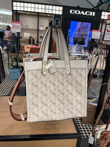 Stores to buy women's zippered tote bags Houston