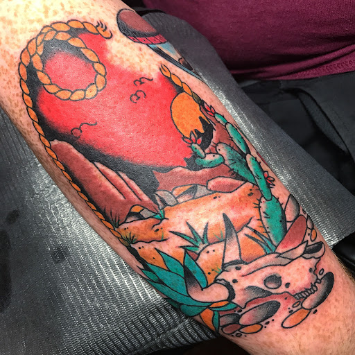 Explore leg tattoo cover up ideas for men, creative tattoo ideas in Lakeland, available at Black Swan Tattoo