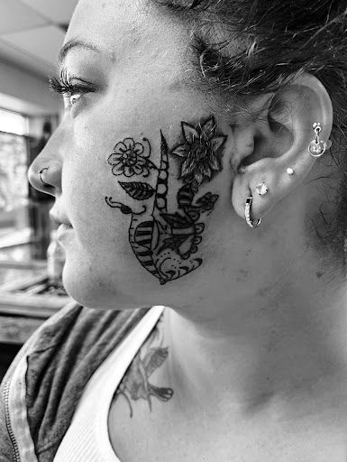 Explore 4 siblings tattoo ideas, creative tattoo ideas in Seymour, available at American Gypsy Tattoo Corp.