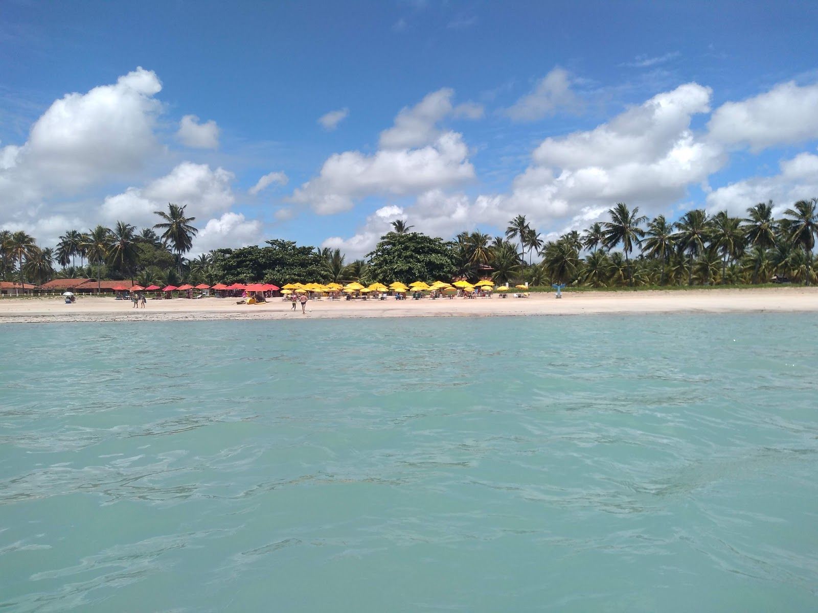 Foto van Praia do Riacho met recht en lang