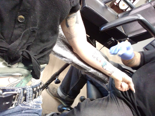 Explore men neck tattoo ideas, creative tattoo ideas in Overland Park, available at Classic Tattoo and Body Piercing