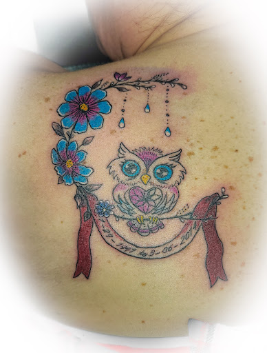 Explore love is pain tattoo ideas, creative tattoo ideas in Logansport, available at Fatt Matts Tatts
