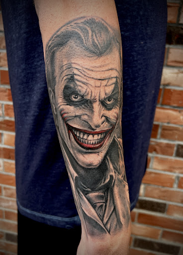 Explore halloween tattoo ideas for men, creative tattoo ideas in East Peoria, available at Hybrid Art Studios-Tattoos