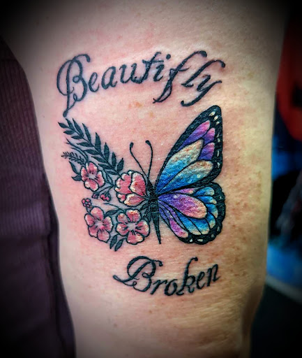 Explore stained glass tattoo ideas, creative tattoo ideas in Nevada, available at Generation X Tattoos and Piercings