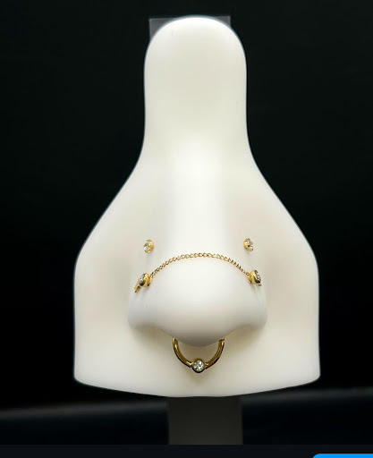 Explore red string tattoo ideas, creative tattoo ideas in Lakeland, available at Holy Grail Tattoo