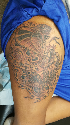 Explore pyramid tattoo ideas, creative tattoo ideas in Elyria, available at Chronic Tattoo