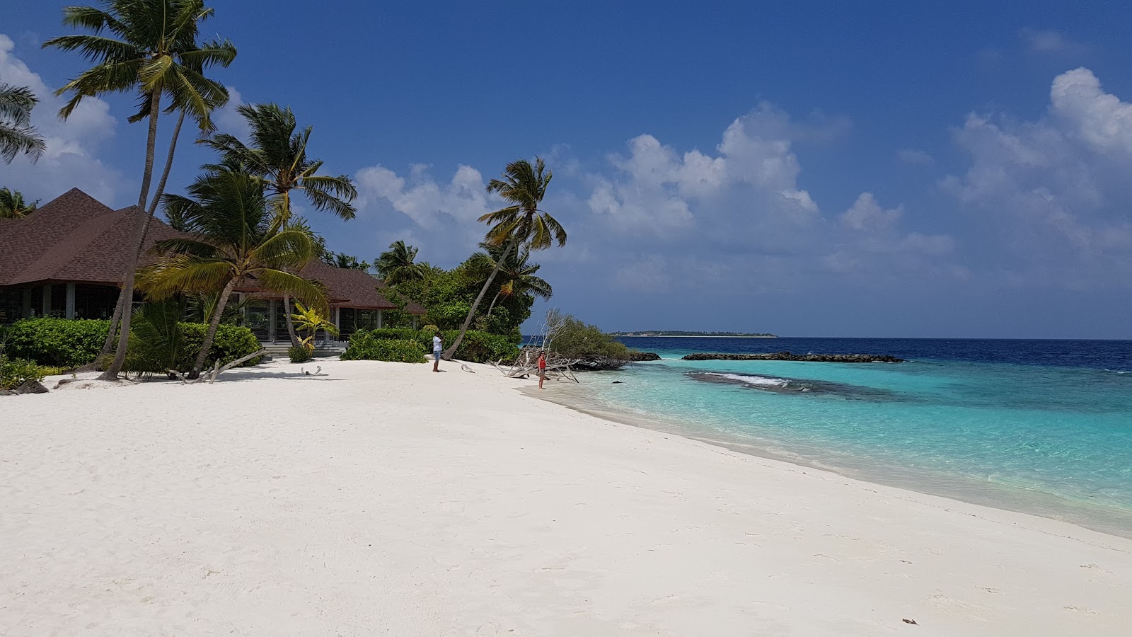 Photo of Dhigali Island Beach with turquoise pure water surface