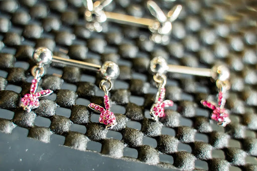 Explore police officer tattoo ideas, creative tattoo ideas in Charleston, available at Exotic Impressions Body Piercing