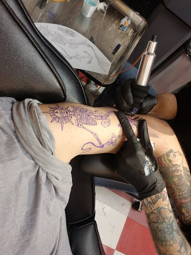 Explore tattoo name ideas for men, creative tattoo ideas in Peoria, available at Mad Tattoo and Piercing