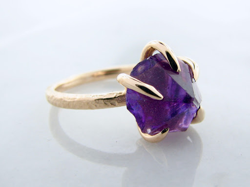 Explore wow tattoo ideas, creative tattoo ideas in Cadillac, available at Wexford Jewelers