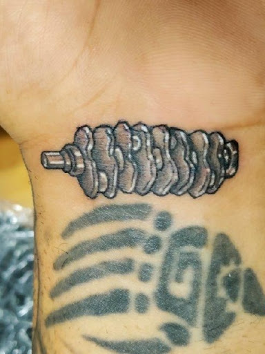 Explore black cat tattoo ideas, creative tattoo ideas in Homosassa, available at Citrus Tattoos