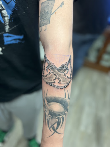 Explore tattoo ideas alice in wonderland, creative tattoo ideas in Milwaukee, available at West Allis Tattoo & Gallery Tattoo Shop Milwaukee