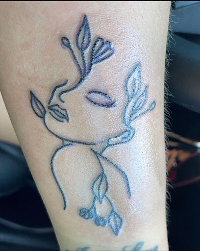 Explore tramp stamp cover up tattoo ideas, creative tattoo ideas in Enid, available at Tangent Wallflower Tattoo