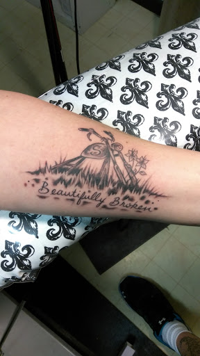 Explore wild idea tattoo, creative tattoo ideas in Bowling Green, available at Taboo Tattoos and Piercings