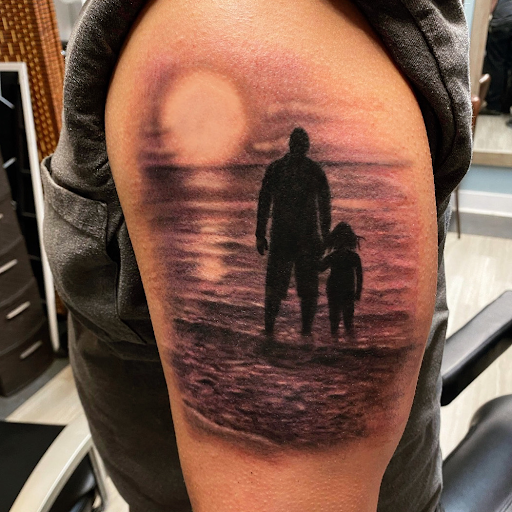 Explore rock n roll tattoo ideas, creative tattoo ideas in Tiffin, available at Ink Element Tattoo Studio