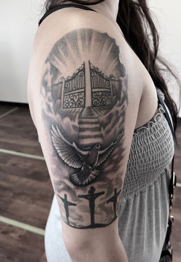 Explore guy shoulder tattoo ideas, creative tattoo ideas in Rogers, available at Ink Solutions Tattoo