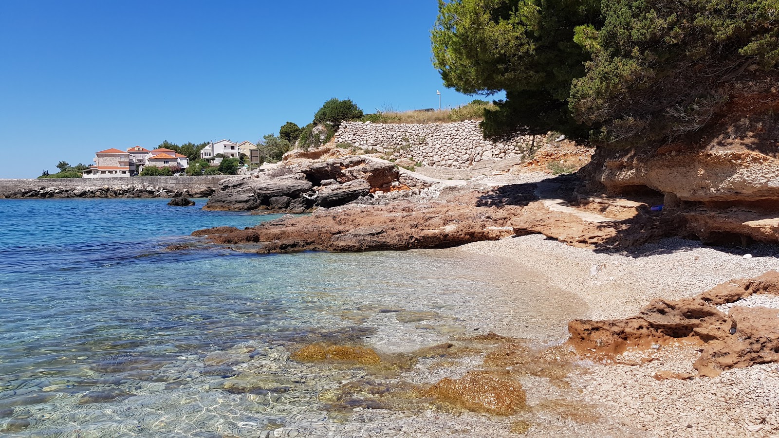 Foto di Stela beach con una superficie del acqua cristallina