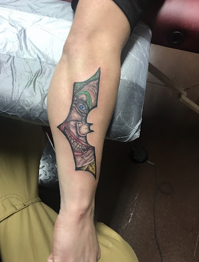 Explore roman numerals tattoo idea, creative tattoo ideas in Macomb, available at Nevermore Tattoo Gallery