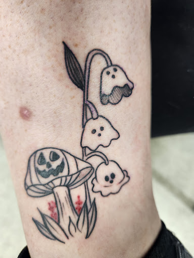 Explore thigh tattoo ideas, creative tattoo ideas in Duluth, available at Tattoo Fiesta