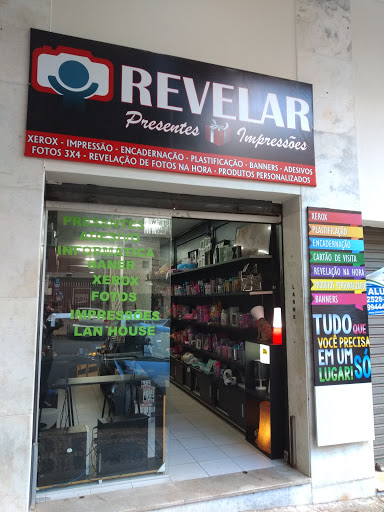 Logo da empresa - Revelar Papelaria e Presentes