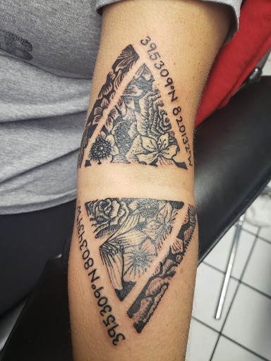 Explore mens back tattoo idea, creative tattoo ideas in Erie, available at EliKingInk