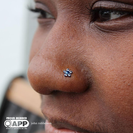 Explore rainbow baby tattoo ideas, creative tattoo ideas in Fort Myers, available at Tiger Lotus Tattoo and Piercing