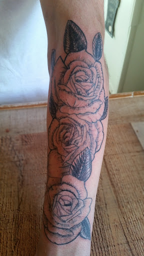 Find tattoo ideas bear for your next unique tattoo in Cumberland at Queen City Ink