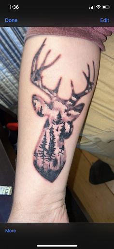 Explore slash tattoo ideas, creative tattoo ideas in Pikeville, available at The Carbon Canary Tattoo Studio