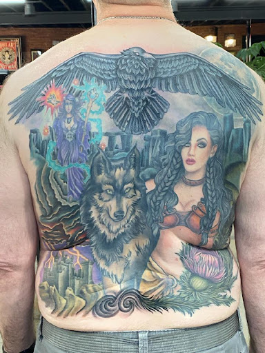 Explore ear tattoo ideas for females, creative tattoo ideas in Council Bluffs, available at Crimson City Tattoo