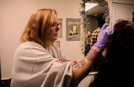 Explore floral sleeve tattoo ideas, creative tattoo ideas in Oskaloosa, available at Soul Ink Tattoo Studio