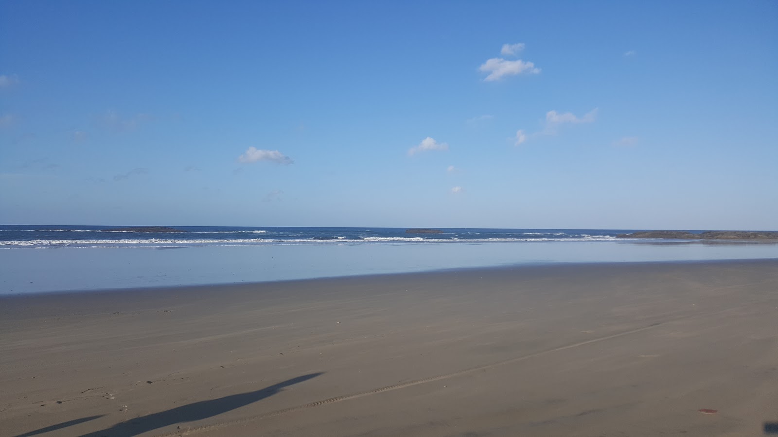 Foto de Playa Tuilapa con agua cristalina superficie