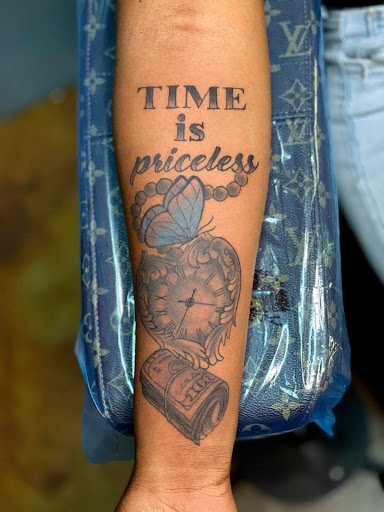 Explore flower tattoo cover up ideas, creative tattoo ideas in Hammond, available at Famous Ink, Inc.