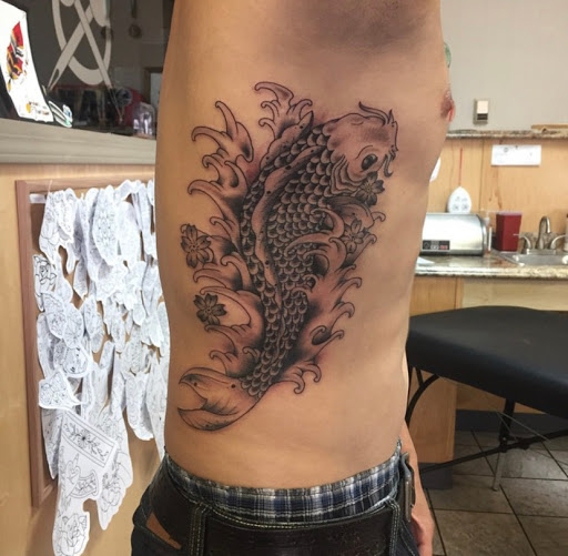 Explore patriotic sleeve tattoo ideas, creative tattoo ideas in Campbellsville, available at Green River Tattoo Company