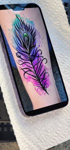 Explore bird cage tattoo ideas, creative tattoo ideas in Berkeley, available at Cleopatra INK Tattoo & Piercing Berkeley Studio