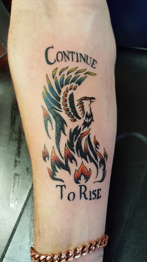 Explore spaceship tattoo ideas, creative tattoo ideas in Forest Lake, available at Dicks Tattoo