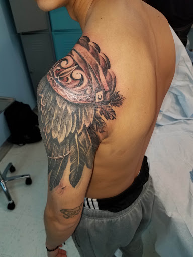 Tattoo Shop «Modern Tattoo Ltd. and Museum of American Tattooing», reviews and photos, 3121 Beacon St, North Chicago, IL 60064, USA