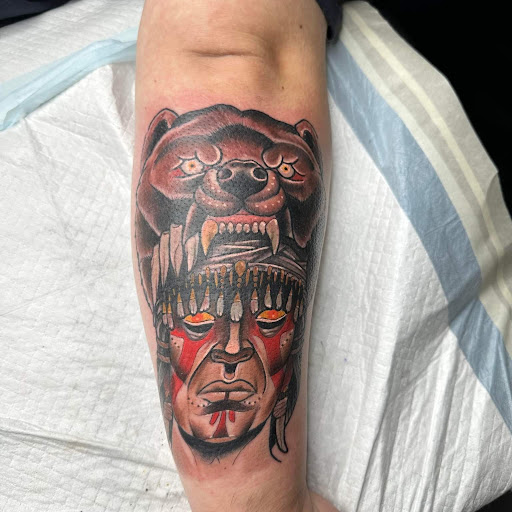 Explore two face tattoo ideas, creative tattoo ideas in Summerville, available at Blackwater Tattoo Co.