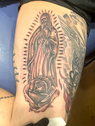 Explore tattoo ideas for the back of the neck, creative tattoo ideas in Phoenix, available at The Snooty Fox Tattoo and piercing