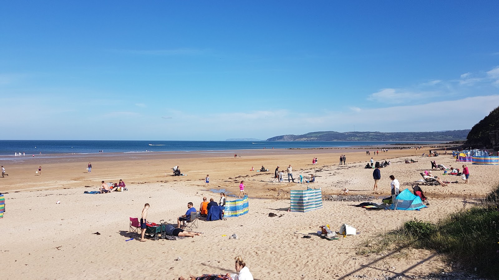 Photo of Benllech Beach with turquoise pure water surface