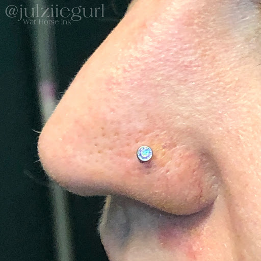 Explore religious tattoo ideas for women, creative tattoo ideas in Kent, available at War Horse Ink