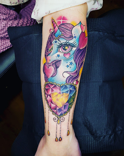 Explore womens sternum tattoo ideas, creative tattoo ideas in Fort Worth, available at Darkside of Texas Tattoo & Piercing