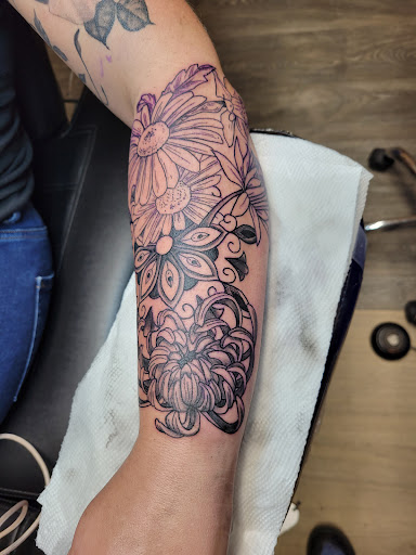 Explore tattoo ideas and designs for men, creative tattoo ideas in Waterloo, available at Friki Tiki Tattoo and Gallery