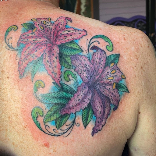 Explore kiss band tattoo ideas, creative tattoo ideas in Saint Augustine, available at Ms. Deborahs Fountain of Youth Tattoo & Body Piercing