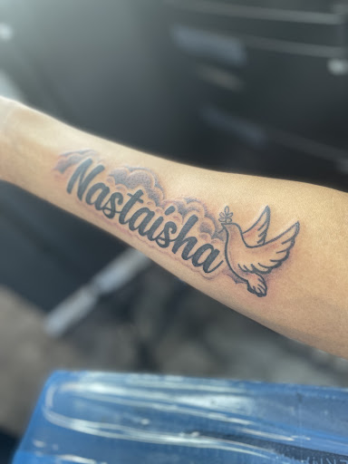 Explore violet tattoo ideas, creative tattoo ideas in Calumet City, available at Skinkraft Ink