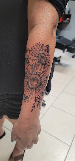 Explore pregnancy loss tattoo ideas, creative tattoo ideas in Ocoee, available at Slaughterized Ink Tattoo and Piercing Studio