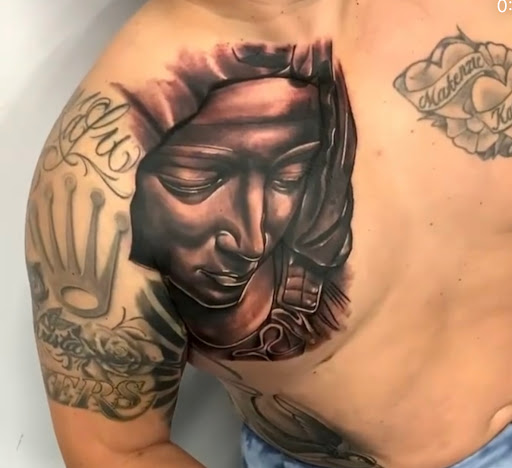 Explore fishing tattoo ideas for females, creative tattoo ideas in Orange, available at Ink Activitiez Tattoo